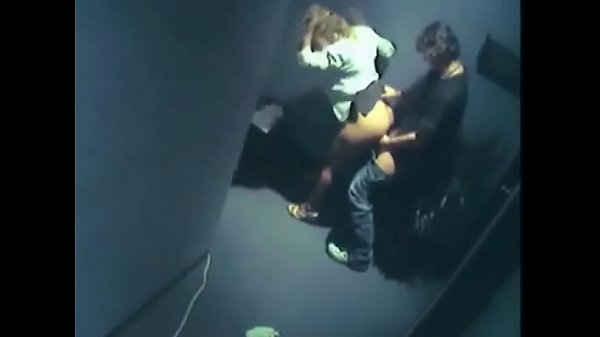 Hidden cam captures hallway sex